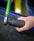 Hand using 32mm Half Inch Drive Axle Nut Socket For Front Wheel Drive Cars, Impact Ready Cr-Mo Steel, on impact wrench.
