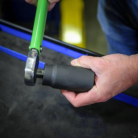 Hand using 32mm Half Inch Drive Axle Nut Socket For Front Wheel Drive Cars, Impact Ready Cr-Mo Steel, on impact wrench.