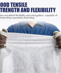 Person holding High Density Stitched Polyester Roof Mesh Fabric 40 X 157.5 Ft showing flexibility and tensile strength.