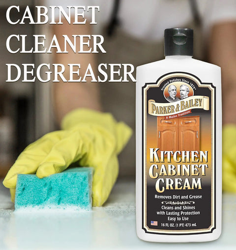 Kitchen Cabinet Creme Cleaner And Grease Remover For Wood Surfaces, No Fuss 16 Oz, yellow-gloved hand with sponge and product