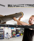 Person placing item on Overhead Garage Shelving Storage Rack Adjustable 3 ft by 6 ft Ceiling Organizer Shelf Space Saving Heavy Duty