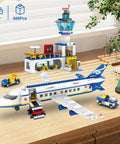 880 Piece City Airport Terminal Building Set with airplane, shuttle bus, luggage cart, terminal, and control tower.
