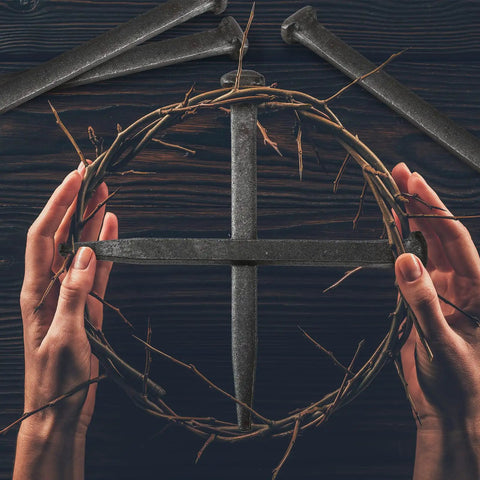 Hands holding a thorn wreath with crossed iron nails beneath, Six Inch Crucifix Iron Nails Set With Flat Head Tacks For Church Decor