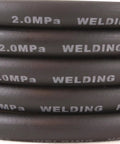 Coiled 5mm welding hose, labeled '2.0MPa WELDING HOSE', part of Industrial Argon Regulator And Flowmeter for MIG and TIG weld rigs.