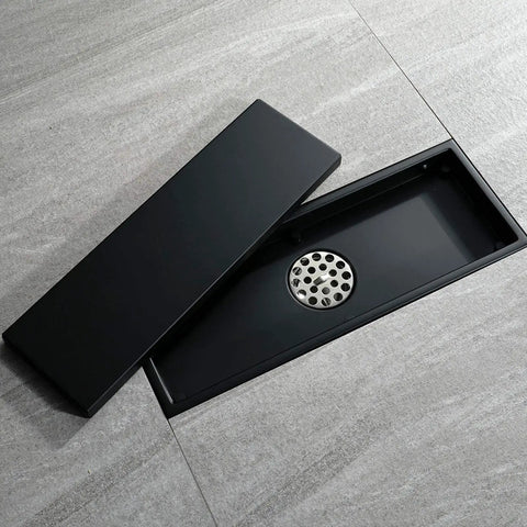Heavy Duty Stainless Steel Linear Floor Drain With Brushed Gold Finish Anti Odor Tile Insert For Bathroom Shower Hassle Free Removable Hair Catcher Cover Top Shelf Rectangular Design installed in grey tile