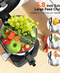 This Super Quiet 400W Cold Press Juicer Boasts A Massive 5.8 Inch Wide Chute For Fast And Easy Prep with assorted fruits.