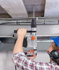 Worker using Heavy Duty SDS Max Rotary Hammer Drill With Vibration Control And Safety Clutch 13 Amp Powerhouse for concrete ceiling