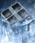 Ice cube tray resting on block of ice with foggy background