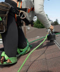 Worker using green Knee Saver Knee Pads For Work And DIY Pro Grade Comfort Cushioned Support Durable Green And Brown Finish Non Slip Straps