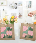 DIY Punch Needle Tote Bag Kit For Adults And Beginners With Video Tutorial And Clear Written Instructions Includes Tools For A Unique Pink Green Tote Pattern You Can Craft On The Go, showcasing finished bag in a stylish setting.