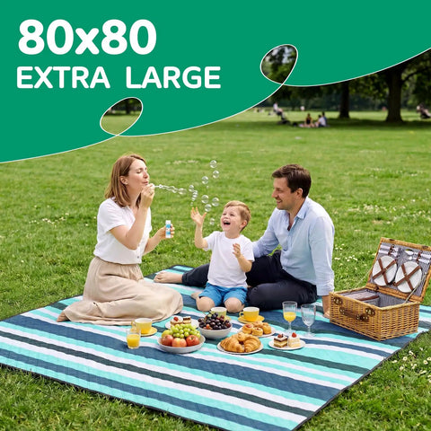 Family enjoying picnic on waterproof beach blanket for picnics and camping extra large sandproof outdoor rug portable XL