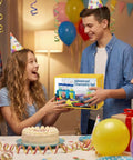 Children at a birthday party exchanging a Hands On Lab Science Kit For Kids With 33 Pieces Of Beakers And Test Tubes, surrounded by balloons.