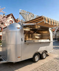 Direct From Yard Aluminum Commercial Food Truck With Dot Certified Mobile Catering Trailer built solid, showcasing stainless finish and side view.
