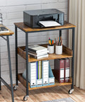 Slick Three Tier Rolling Kitchen Microwave Cart Featuring Rugged Steel Frame For Hella Spacious Storage And Smooth Mobile Coffee Bar Or Living Room Side Table Platform with printer and office supplies.