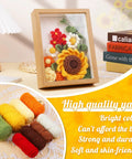 Sunflower Crochet Kit With Photo Frame Easy Diy Fun Flower Craft Set With Yarn Hooks Stitch Markers Floral Wire Fiber Fill Instruction Beginner Friendly Gift For Mothers Day And Thanksgiving displayed on a desk.