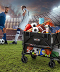 400L Double Decker Folding Utility Wagon With 450Lb Capacity And 47 Inch Extended Shelf For All Terrain Hauling in stadium