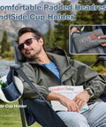 Man relaxing in Hammock Camping Chair With Adjustable Backrest And Pillow Cup Holder, Heavy Duty 350 Lbs Oversized Swinging Chair