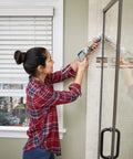 Person applying Advanced Silicone Kitchen And Bath Sealant In Almond Color For Easy DIY No Mess Caulking in bathroom