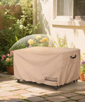 Rectangular Gas Fire Pit Table Cover 44 By 28 Inch Waterproof Heavy Duty Outdoor Fire Pit Cover on patio among plants