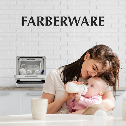 Portable Compact Countertop Dishwasher With Built In Five Liter Water Tank Plug And Play Quick Cycles Renters Approved For Tiny Apartments Rv Camper Dorm Spaces Cleans Plates Glasses And Baby Bottles No Sweat, displayed in a cozy kitchen setting with a mother and infant.