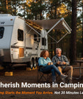 Couple enjoying coffee outside a travel trailer with awning, demonstrating the ease of camping with the Hassle Free Wireless RV Leveling System With Bluetooth App Control For Travel Trailers Fifth Wheels And Motorhomes Features Real Time Pitch Roll Monitoring To Park Dead Center Without Breaking A Sweat.