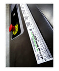 Magnetic Flexible Ruler For Metal Surfaces 24 Inch Stark White in use on dark metal machine surface