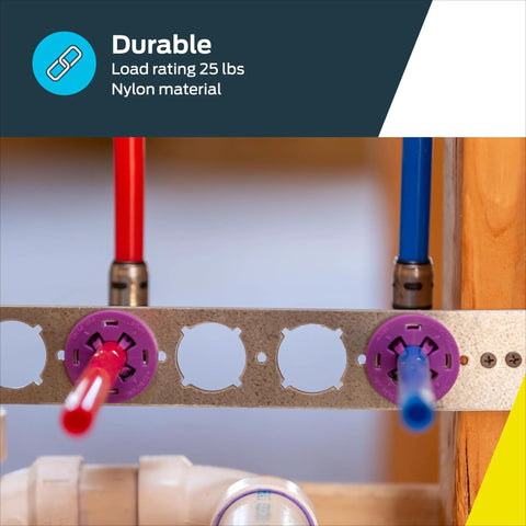 Installed HoldRite PEXRite stub-out clamp for 1/2 in CTS pipe; purple clamp secures red and blue PEX tubes to a metal rail.