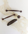 Solid Core Cabinet Pulls Set of 10 in Rustic Iron with 3 inch center to center on marble background