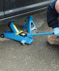 Universal Floor Jack Pad and Rubber Pinch Protector for Cars, SUVs, Trucks and More, 3 Ton Jack Stand Adapter in use