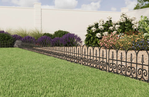 Go-To Classic Wrought-Iron Style Garden Border Fence Kit In Black surrounding flower beds and greenery in yard