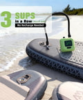 Electric SUP Pump With Battery For Paddle Boards inflating on beach with three boards, hose connected, screen displaying 12.0 PSI.