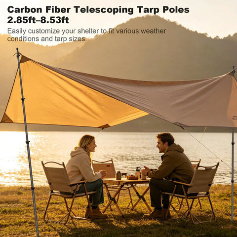 Camping scene with Ultralight Carbon Fiber Telescoping Tarp Poles For Hiking Adjustable Rugged Featherweight 2 Pack setup by a lake.