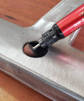Set Of 50 Rotary Grinding Stones With 1/8 Inch Shank For Rotary Tools Aluminum Oxide Abrasive Mounted Bits For Sharpening, Grinding And Sanding 15mm Grinding Points shown in use on metal surface