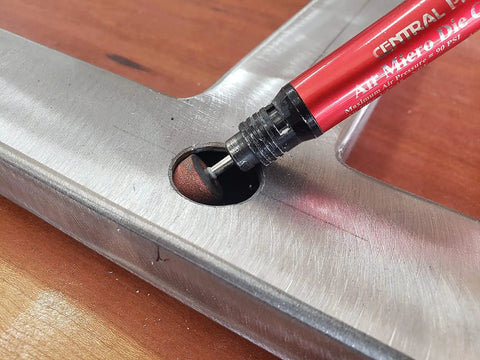 Set Of 50 Rotary Grinding Stones With 1/8 Inch Shank For Rotary Tools Aluminum Oxide Abrasive Mounted Bits For Sharpening, Grinding And Sanding 15mm Grinding Points shown in use on metal surface