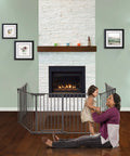 Woman and child near Oxford 3-in-1 Play Yard Baby Gate and Fireplace Fence for a 151 inch extra wide barrier in living room