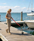 Person using Trailer Breakaway Cable 4ft 6ft Heavy Duty Rugged Stainless Steel Flexible High Strength With Clear Sheath on dock