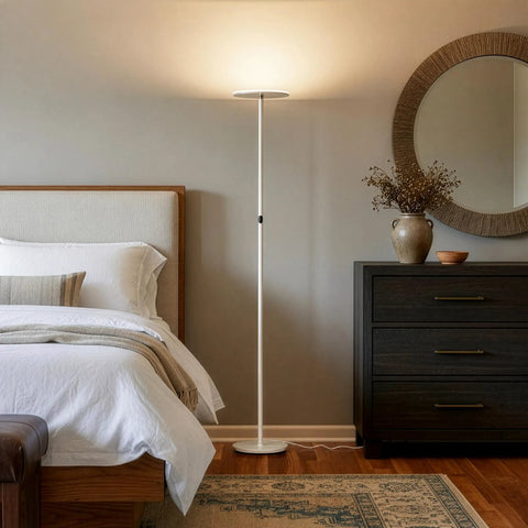 Sky LED Floor Lamp Torchiere Lit And Super Bright Dimmable Tall Standing Lamp next to bedroom furniture.
