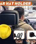 Driver's view with yellow hard hat on headrest using Hard Hat Holder For Truck And SUV 2 Pack Keeps Cap Shape While Driving