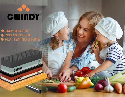 Dual Sided Whetstone Knife Sharpening Kit With 400 1000 And 3000 8000 Grits Wet Stone Set next to family cooking in kitchen