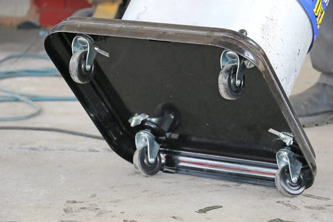 Lincoln 917 Pro Grade 50 To 1 Pneumatic Grease Pump showing roll-around base with wheels