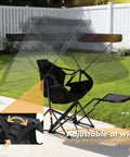 Portable Folding Hammock Camping Chair With Canopy And Footrest in a backyard showing adjustable shade and footrest feature.