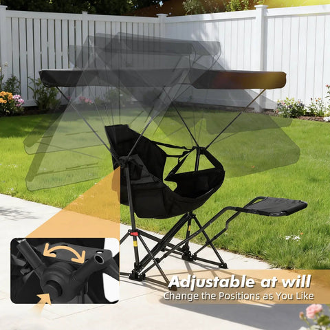 Portable Folding Hammock Camping Chair With Canopy And Footrest in a backyard showing adjustable shade and footrest feature.