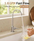 KES NSF Certified All Metal Drinking RO Water Faucet Non-Plastic Connector filling a pitcher with water in a kitchen.