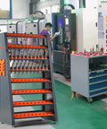 Beefy Heavy Duty Tool Holder Rack For Machining Shops And Garages With Eight Row CAT40 Organizer And Parts Box All Steel Construction For High Capacity CNC Tool Storage in shop setting.