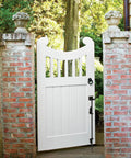 24 Inch Cane Bolt Drop Rod For Gates And Fences Black Finish Heavy Duty Ground Latch on white wooden gate
