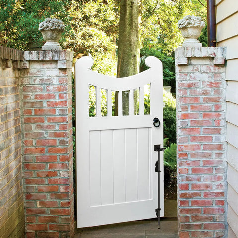 24 Inch Cane Bolt Drop Rod For Gates And Fences Black Finish Heavy Duty Ground Latch on white wooden gate