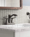 Truss Center Set Lavatory Faucet With Lever Handles Craftsman Inspired Bathroom Tap with water running into a white sink