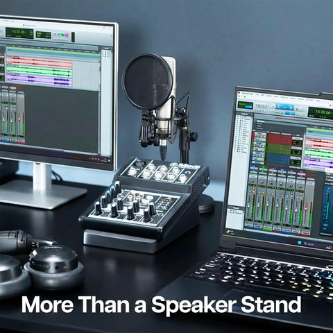 Home studio with audio equipment next to Two Pack Desk Speaker Stands With 15 Degree Tilt For Bookshelf And Desktop Speakers 5 X 8 Inch Anti Vibration Risers For That Clean Loud Sound, Universal Fit, Studio Grade Audio Elevation, Black.