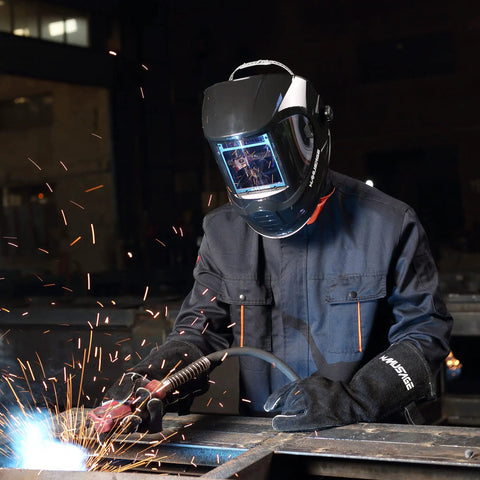 Welder wearing Panoramic View Auto Darkening Welding Helmet with 4 Arc Sensors Solar Power True Color Shade 5-8 and 9-13