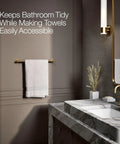 Purist 18-Inch Towel Bar In Vibrant Brushed Moderne Brass Dope Finish holding a towel in a modern bathroom setting.